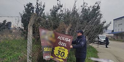 ALTINORDU BELEDİYESİNDEN İZİNSİZ AFİŞ VE PANKARTLARA MÜDAHALE